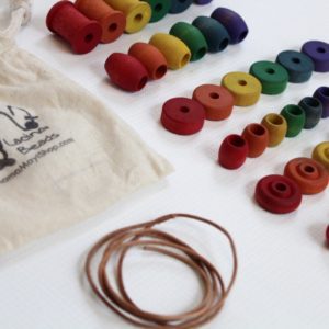 Lacing Beads - A Montessori and Waldorf Inspired Fine Motor Skill Game