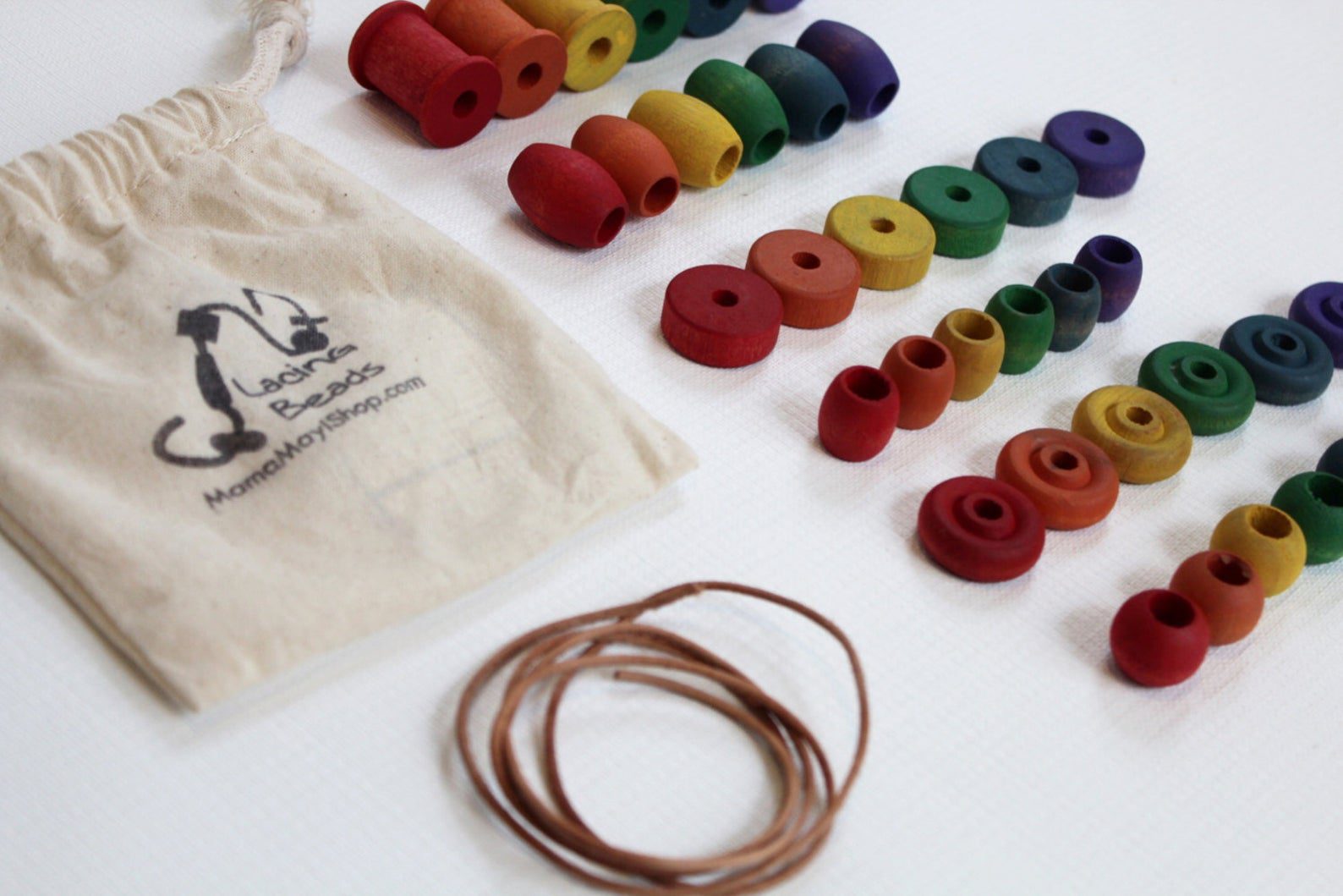 Lacing Beads - A Montessori and Waldorf Inspired Fine Motor Skill Game